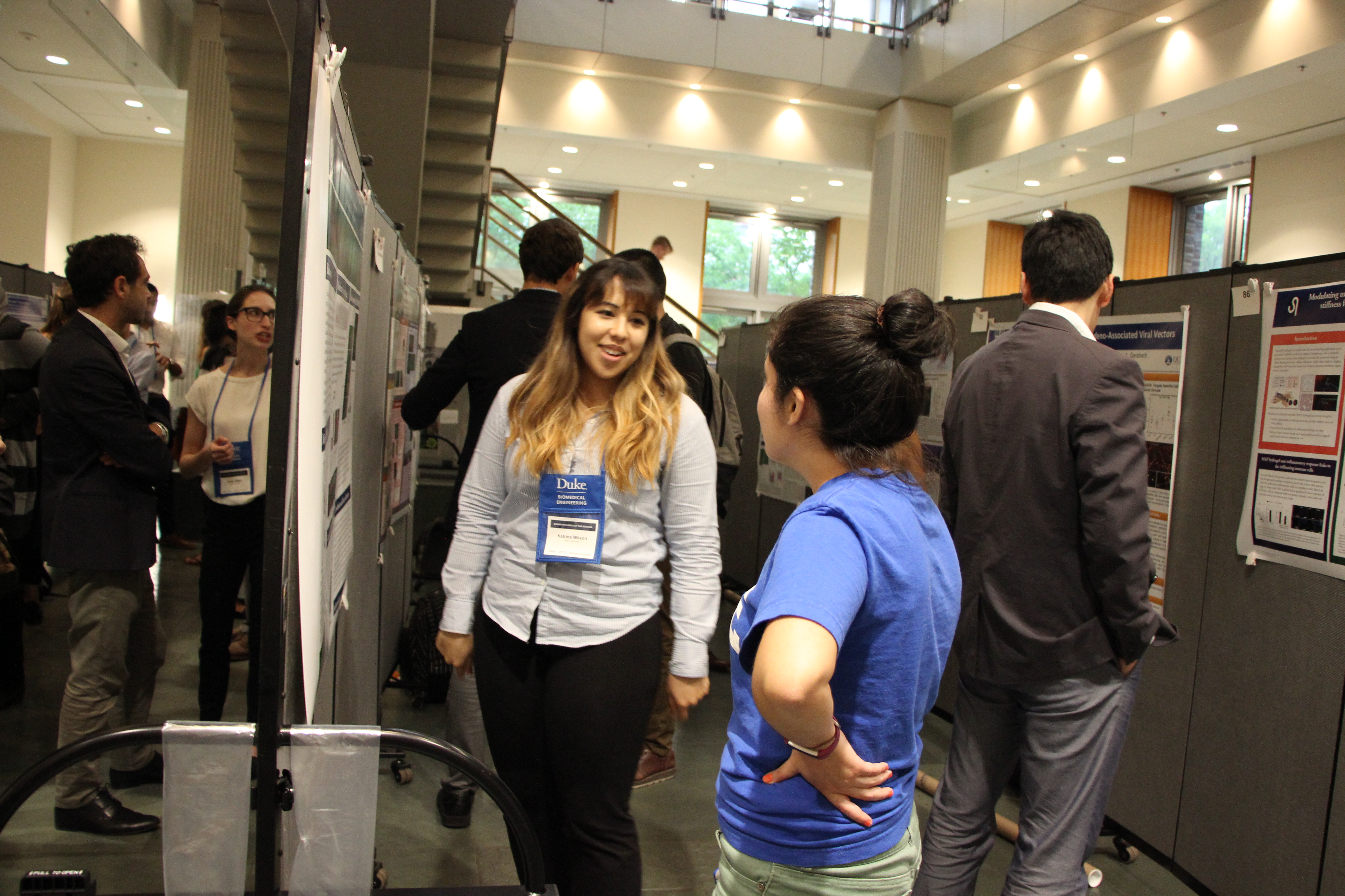 Researchers present their work during the poster sessions at the Engineering Biology for Medicine conference.
