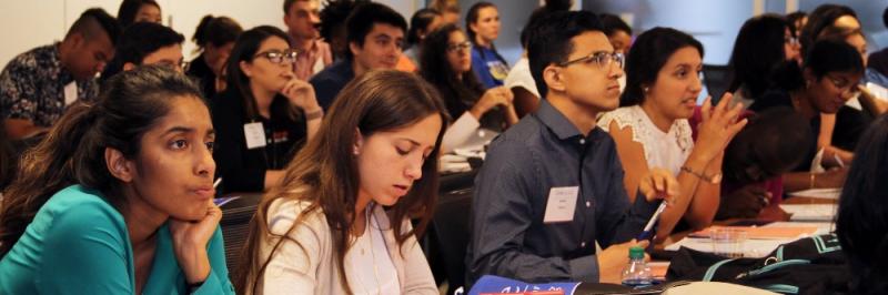 students listen to a speaker at the grad programs boot camp