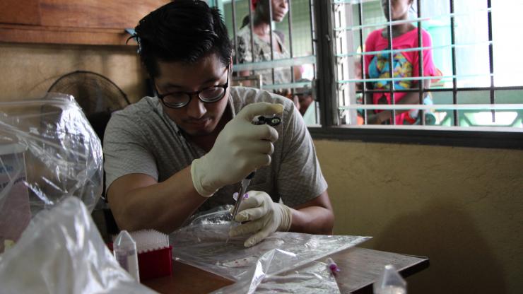 Daniel Joh, an MD-PhD student in BME, prepares serum samples during a field test at the Redemption Clinic in Monrovia, Liberia