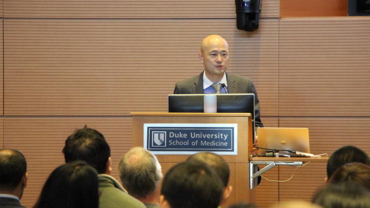 Xiling Shen addresses the crowd at the inaugural Precision Medicine Conference