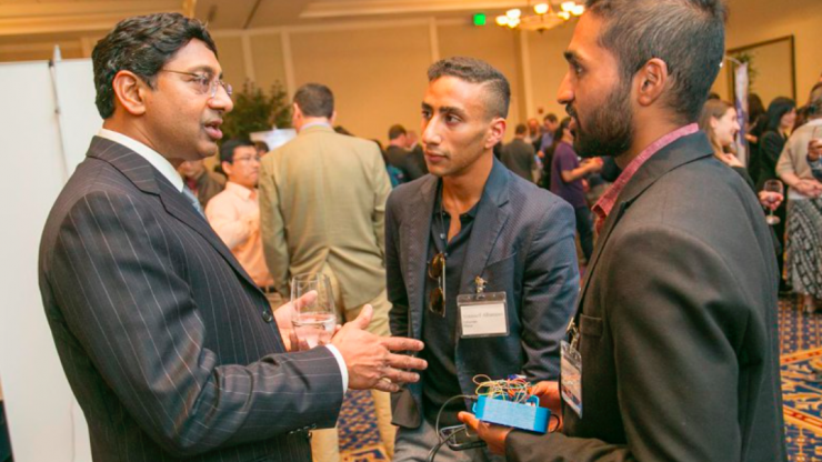 At our 1st Annual Invented at Duke Celebration, Professor Ravi Bellamkonda, Dean of the Pratt School of Engineering chats with a Duke Alumni and a member of the local community about inventions, innovation, and entrepreneurship. Photo by Jared Lazarus/Duke Photography