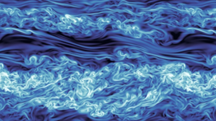 White swirls of turbulence within blue ocean waters