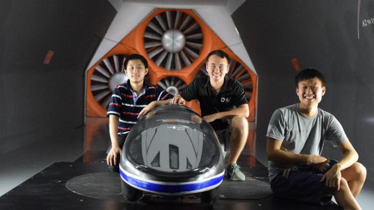 Duke students in wind tunnel with record breaking car 