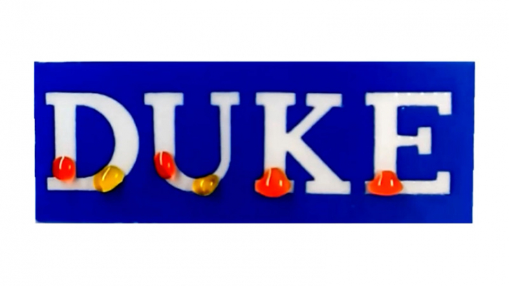 DUKE spelled out in blue background with colored liquid droplets inside various places