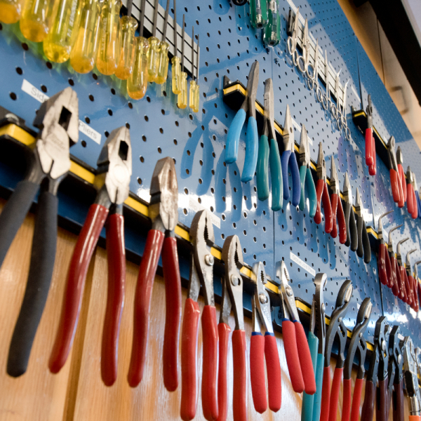 Handtools hang on pegboards in the Design Pod at Duke University
