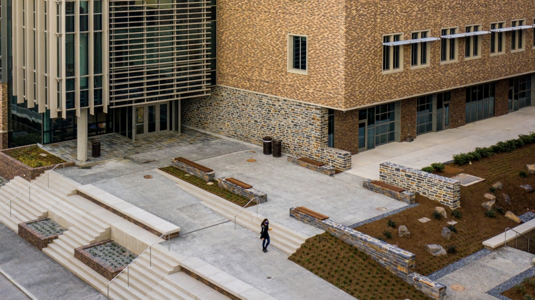 Duke stone lines the main entry of the Wilkinson Building, and is used for retaining walls and landscaping to emphasize ties to the historic campus.