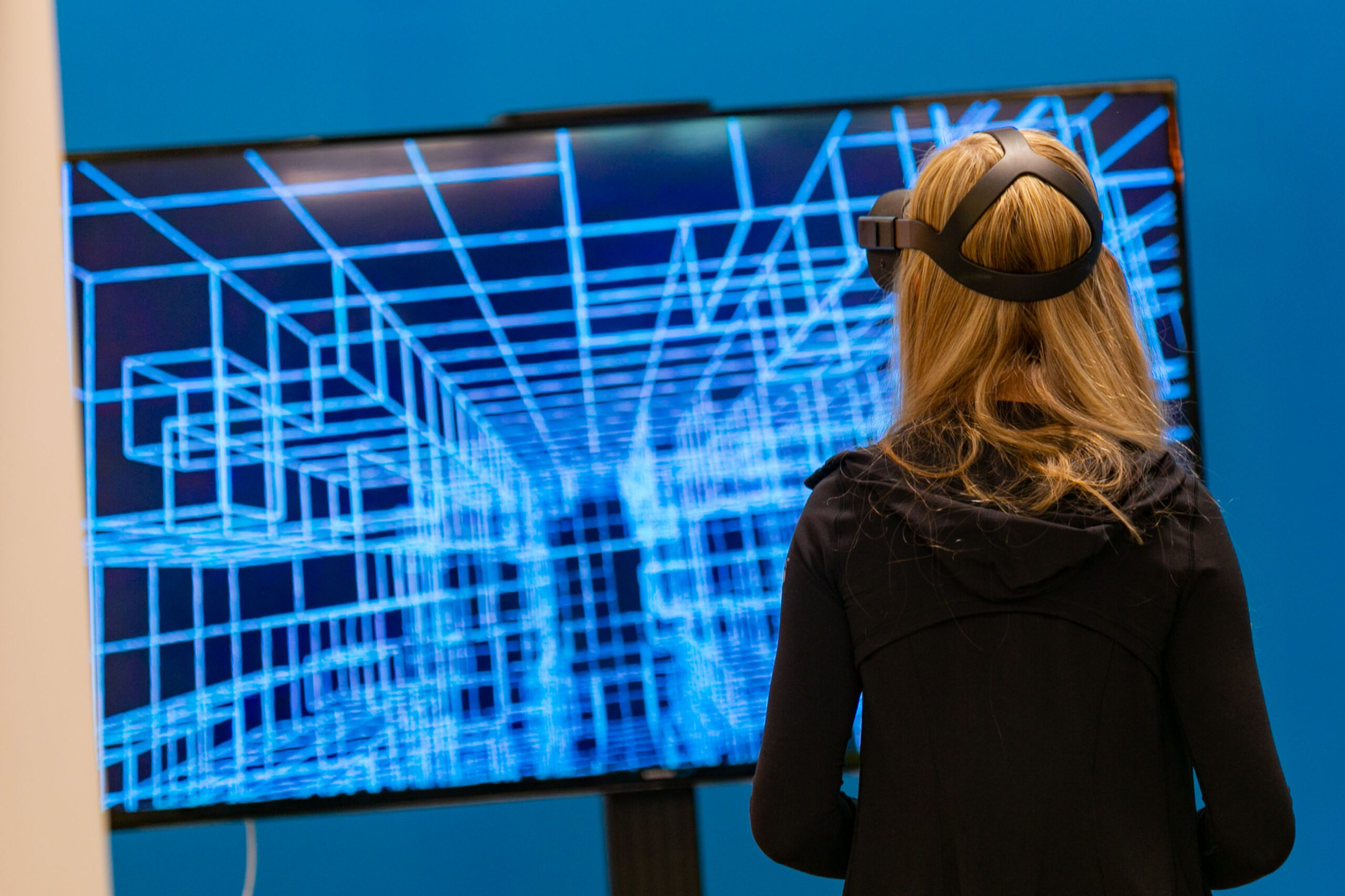 A student tests out a virtual reality set in the co-lab