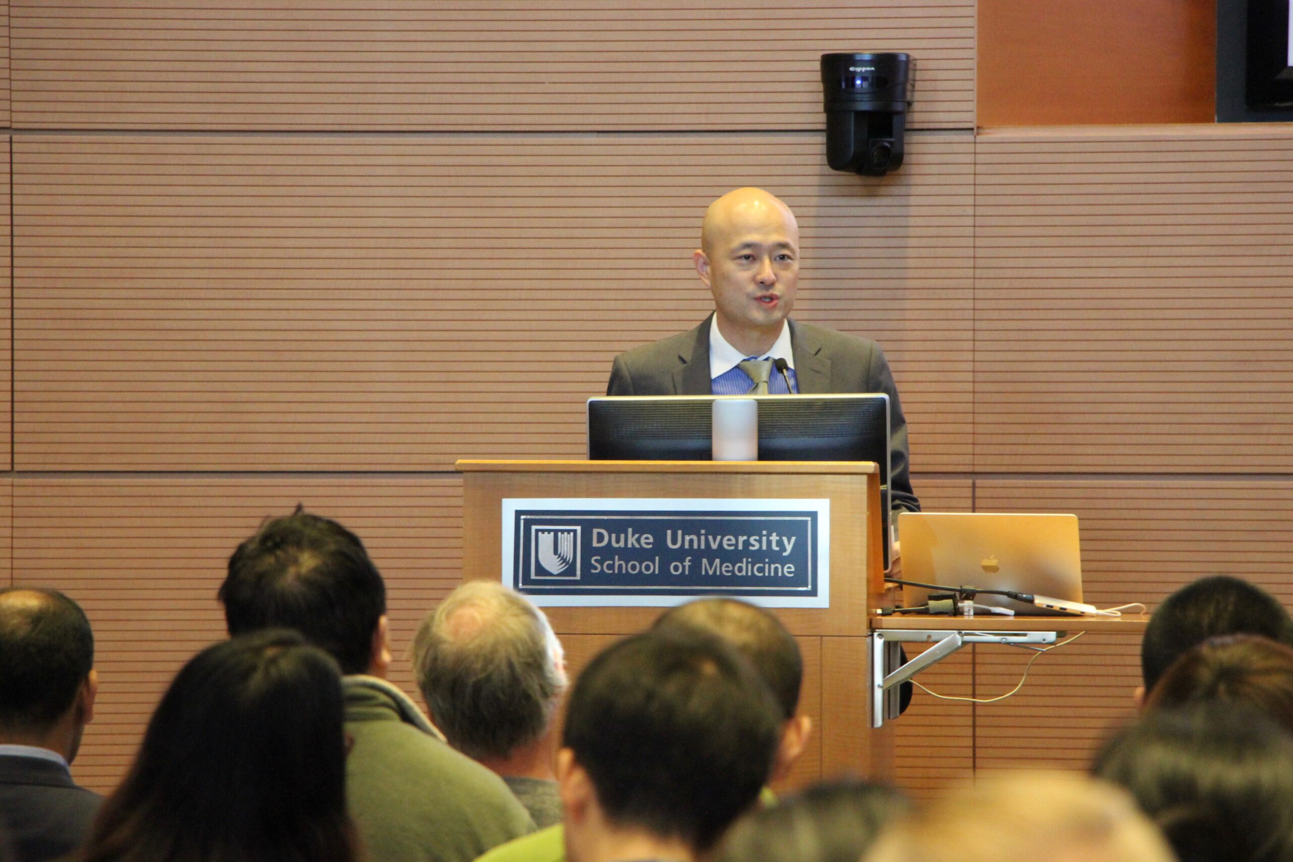 Xiling Shen addresses the crowd at the inaugural Precision Medicine Conference