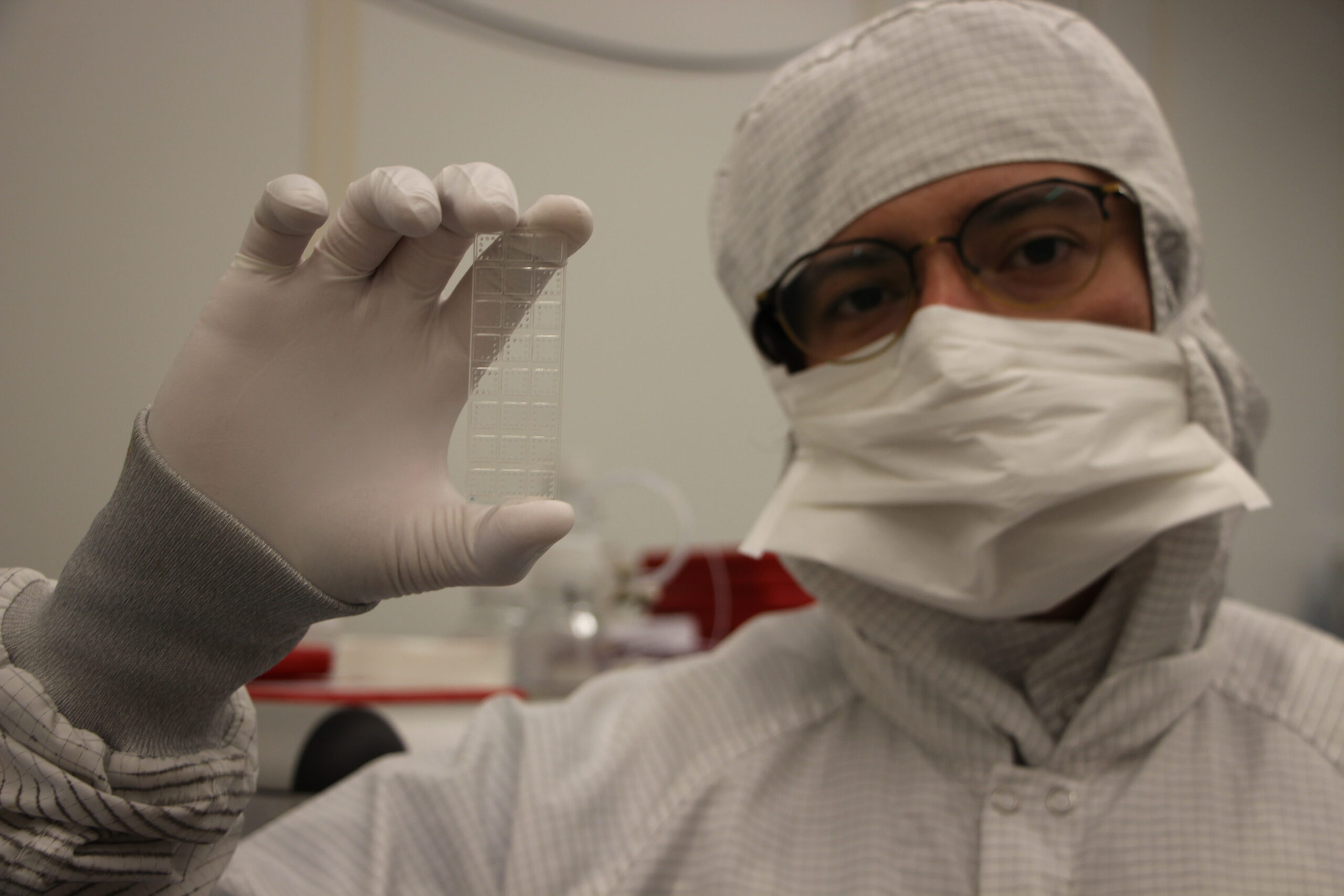 Cassio Fontes, PhD, holds up the D4 assay