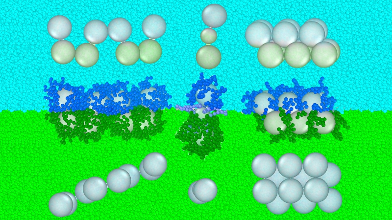 Various configurations of structures made of spherical nanoparticles floating in two differently colored layers of liquid
