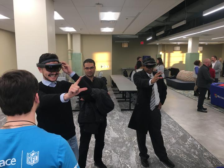 Two people with virtual reality headsets on