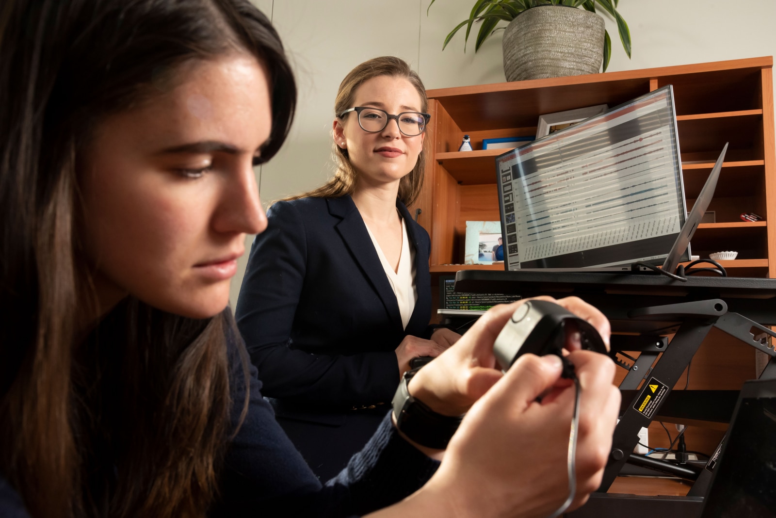 A professor oversees a graduate student's work