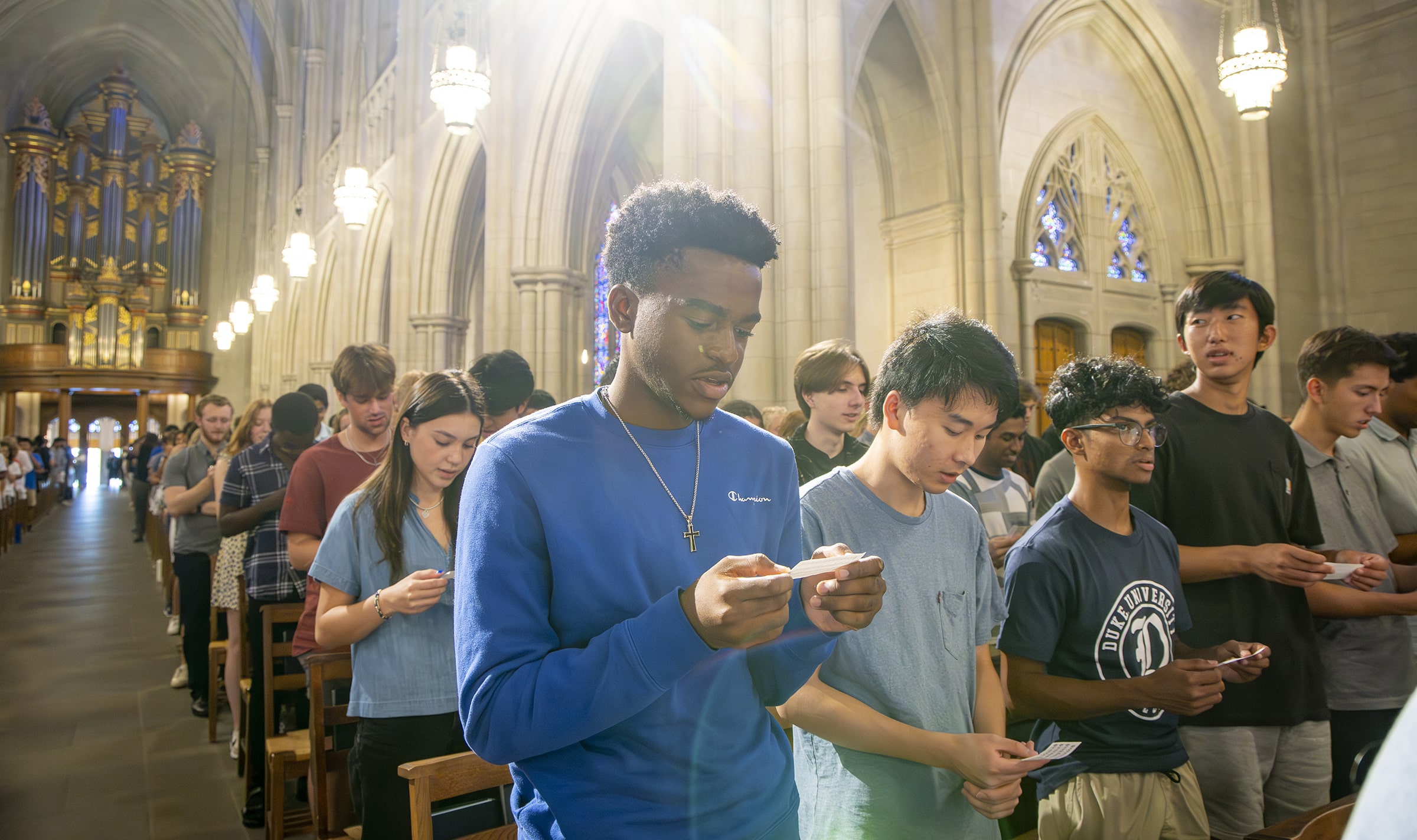 First-years and transfer students sing the Alma Mater during the Convocation for New Undergraduate Students at Duke Chapel.