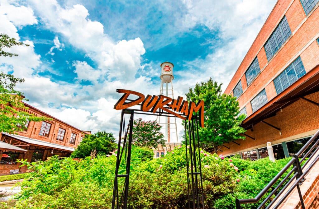 The Durham Sign at American Tobacco Campus was created by Liberty Arts and Cricket Forge and erected in April of 2019 as a tribute to the strength and resilience of the Durham community. Photo by Discover Durham