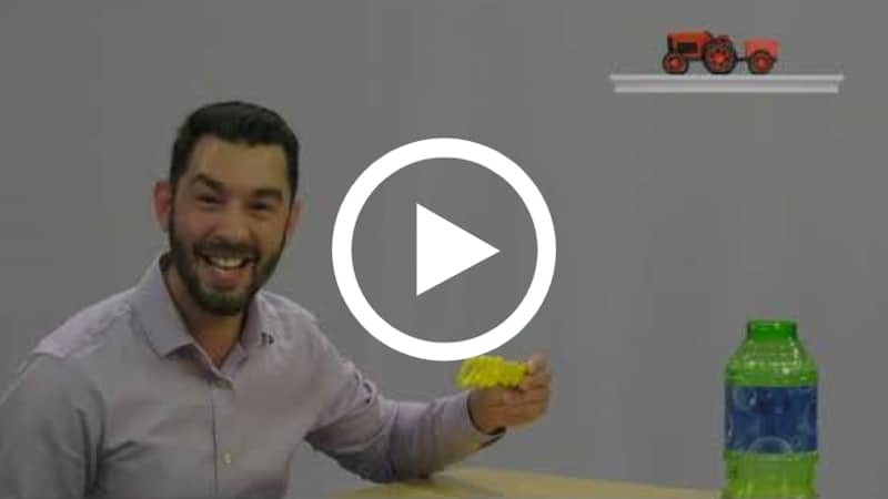 A man in a video holding a bubble blower