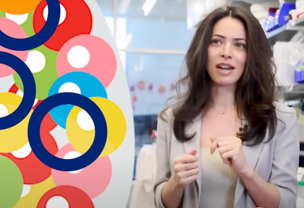 a woman appears to the right of a graphic of colorful circles