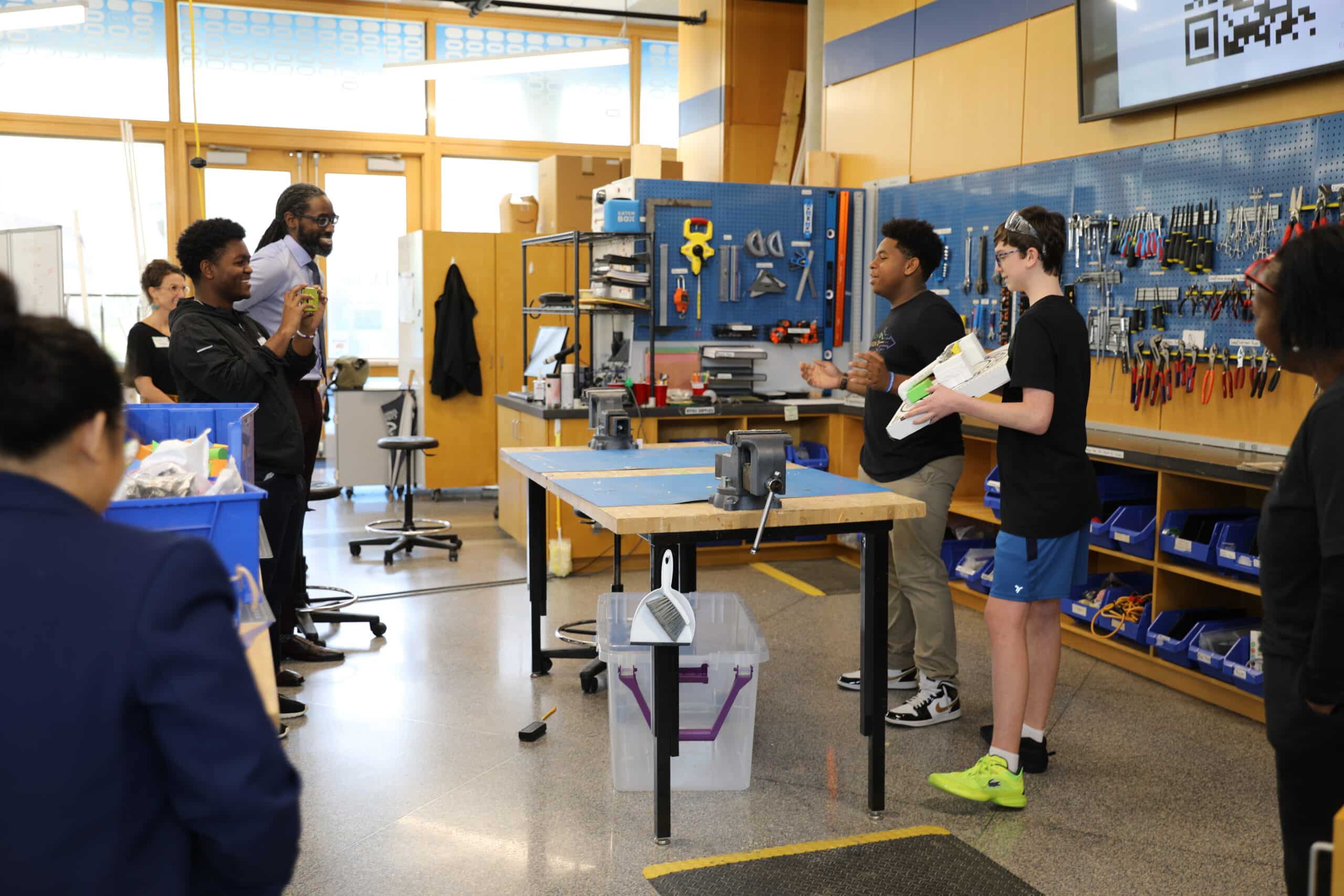 image of students and faculty in the design POD for a hackathon