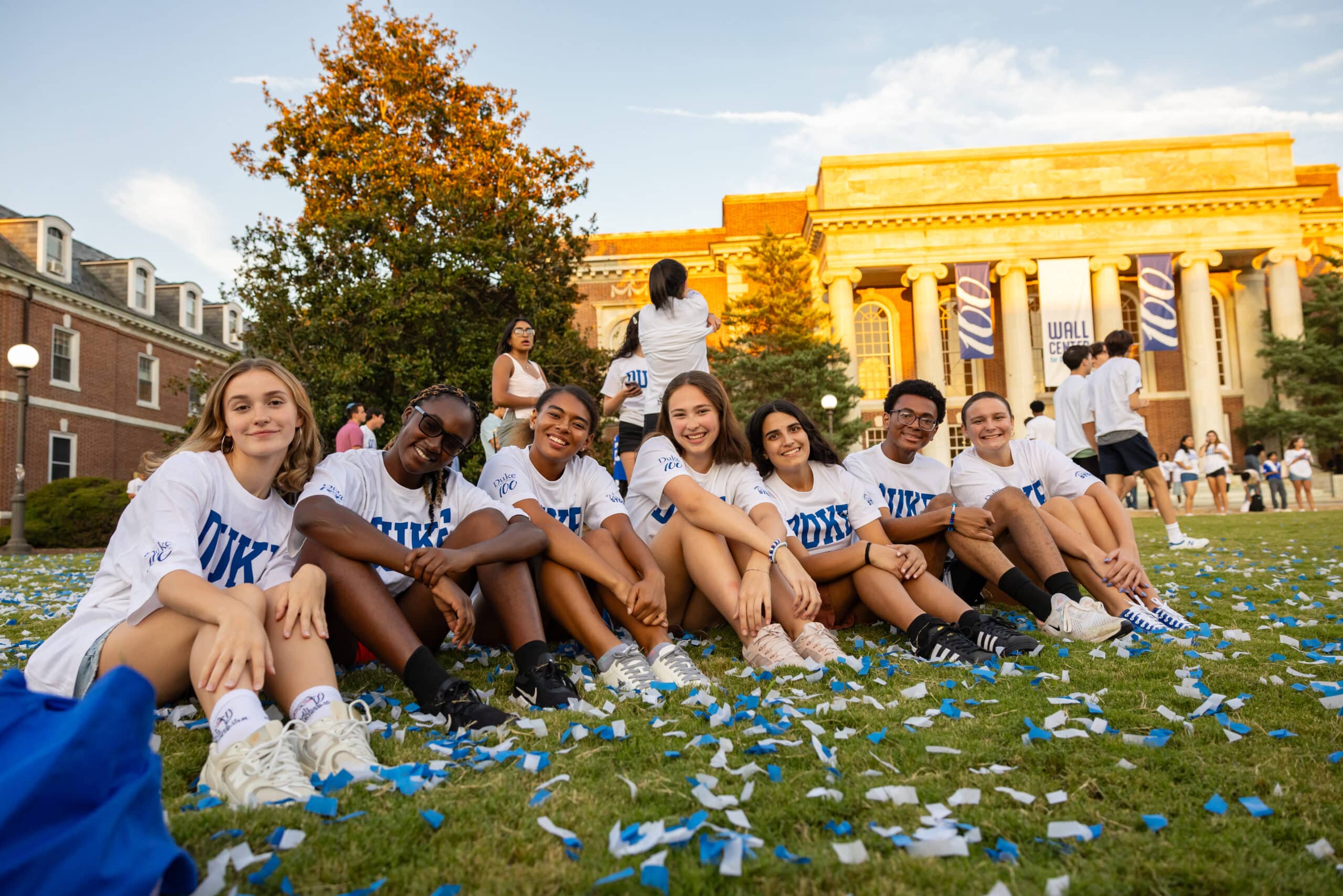 Duke University students sit together on the quad