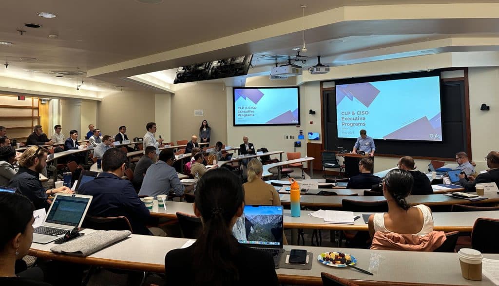 people assemble in a modern university seminar room