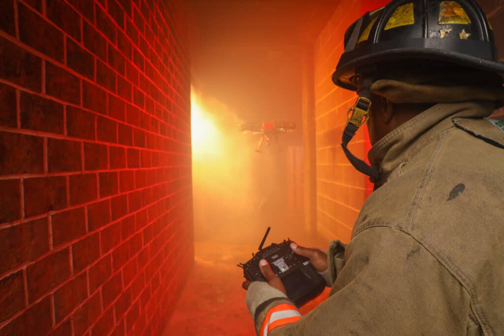 Durham Fire Department personnel testing a robot with Athena