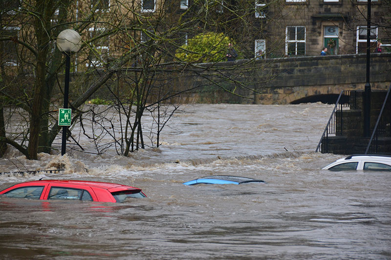 cars buried in floodwaters