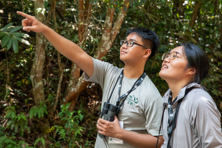 Nicholas School of the Environment PhD student Siqi Liang and Chee Koi Jun, a student at the National University of Singapore, go birding near the Central Catchment Nature Preserve in Singapore during the XPRIZE Rainforest competition semifinals.