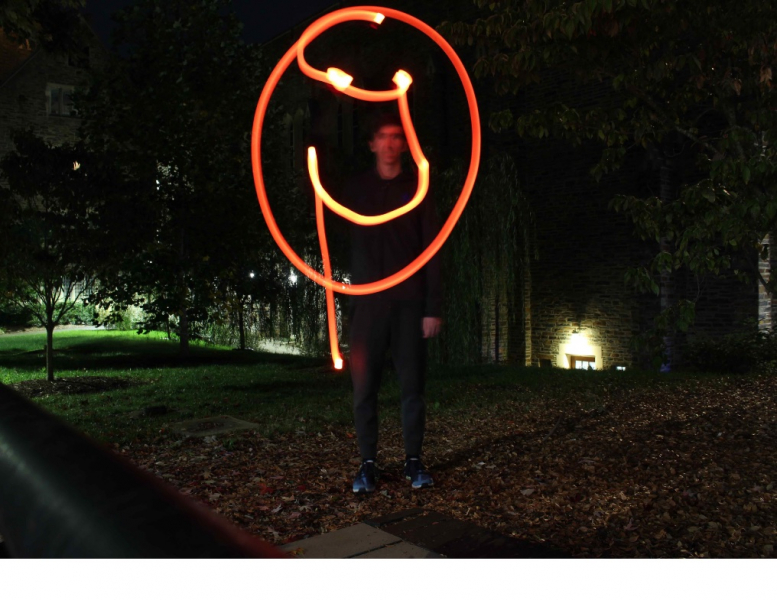 Light painting of an orange smiley face