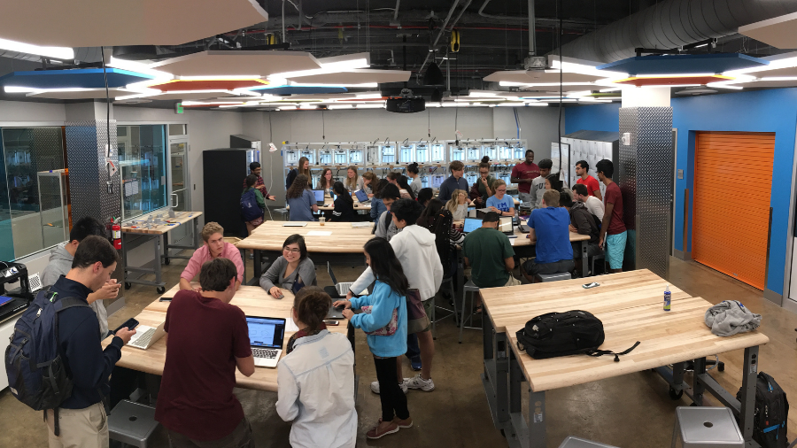 A group of students from Project eNable meets in the Innovation Co-Lab 