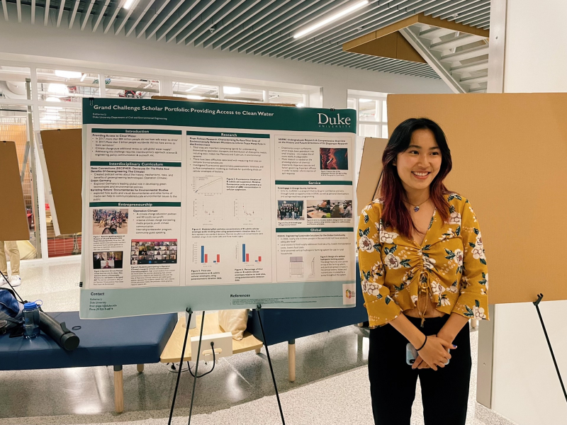 Katherine Li presents her research at a poster session